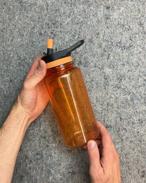 Orange Water Bottle That Can Help You Track Your Hydration Too