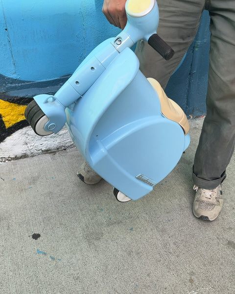 Skootcase! A Ride-on scooter And Carry-on Suitcase