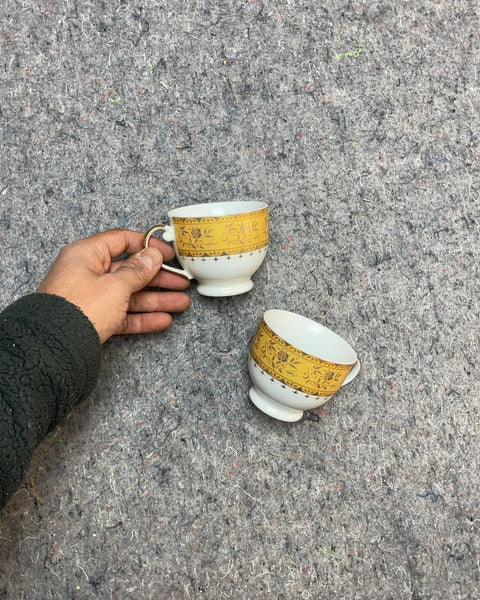 Two Golden Tea Cups
