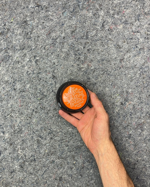 Orange Positive Affirmation Button That Shouts A Random Nice Things At You When You Press It