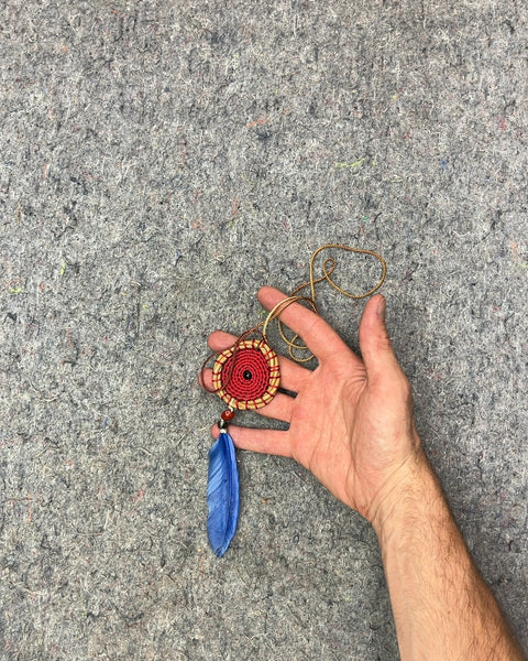 Red Woven Pendant Necklace with Blue Feather