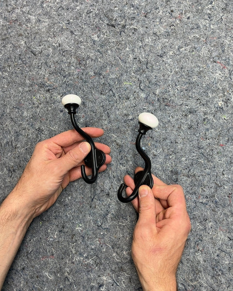 Black Metal Wall Hooks with White Ceramic Knobs