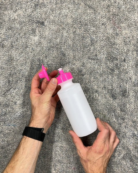 White Plastic Water Bottle with Pink Lid