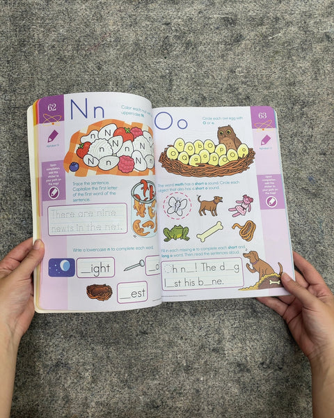 Summer Brain Quest: Between Grades K & 1 by Megan Butler and Claire Piddock