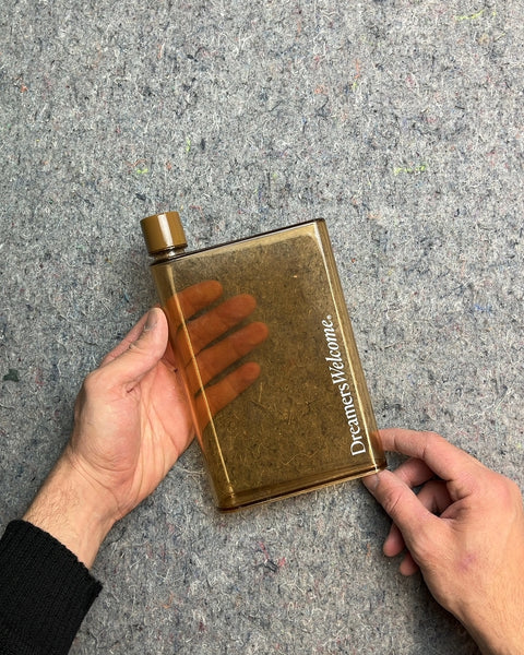 Brown Flat Water Bottle with "Dreamers Welcome"