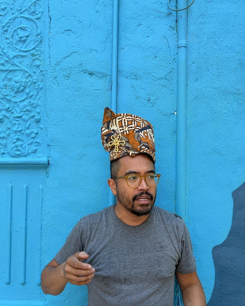 Patterned Fabric Hat with Gold Brooch