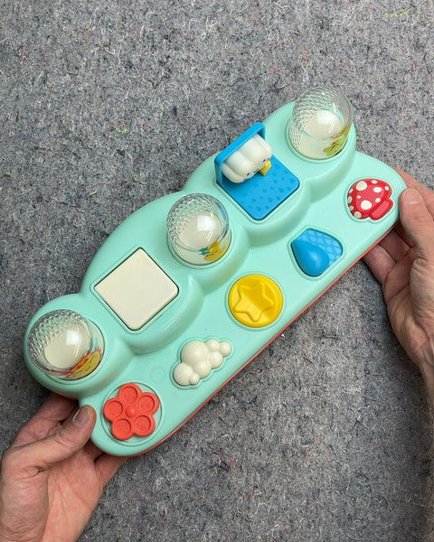 B. toys Pop-Up Buddies Cause & Effect Toy