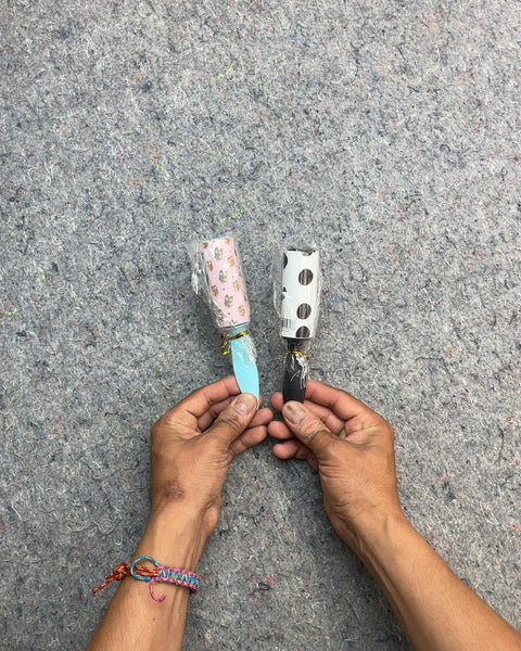 Two Mini Lint Rollers with Patterned Sheets