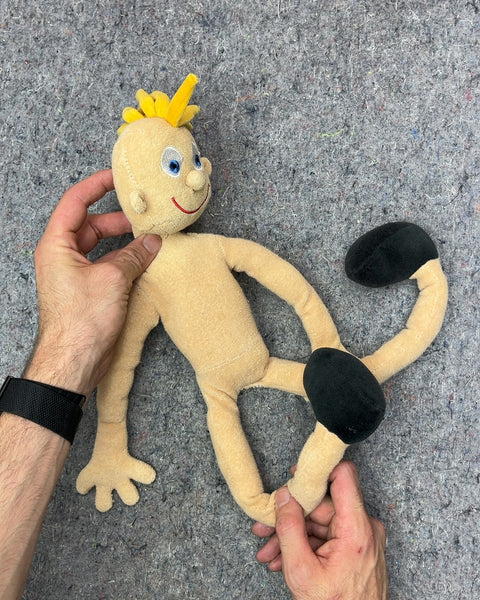 Funky Looking Yellow Haired Plush Doll