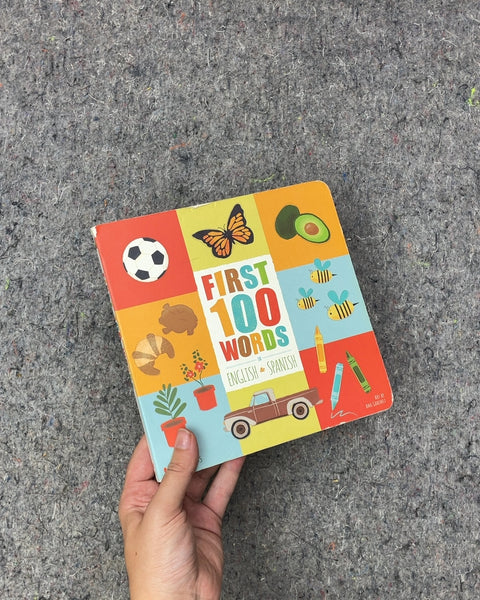 First 100 Words English Spanish Board Book by Ana Godinez