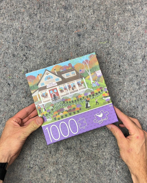 Unopened Cardinal Mum's Guest House 1000 Piece Jigsaw Puzzle