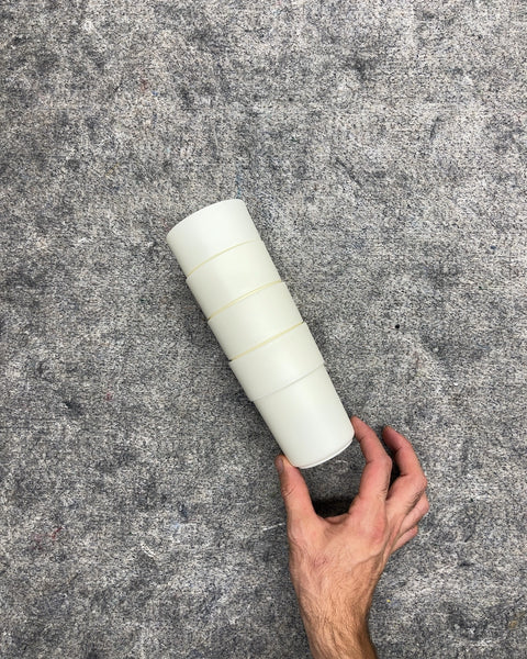 Four White Stackable Plastic Drinking Cups
