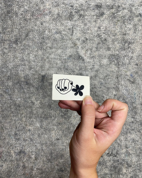 Hand Holding Flower Temporary Tattoo