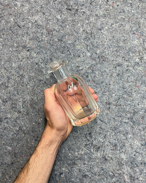 Clear Glass Bottle That Would Make A Pretty Lil' Vase