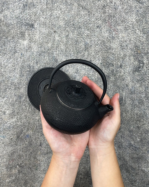 Cast Iron Teapot with Two Cups and Trivet