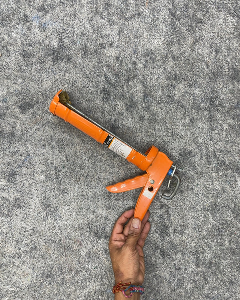 Dripless 10 oz Orange Caulking Gun