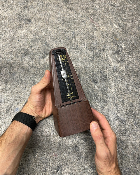 A Faded Mechanical Metronome That Works