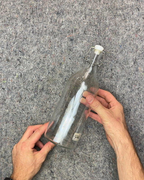 Clear Glass Bottle with Swing Top Lid