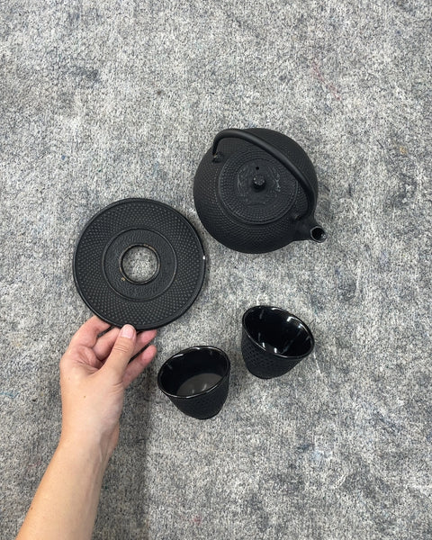 Cast Iron Teapot with Two Cups and Trivet