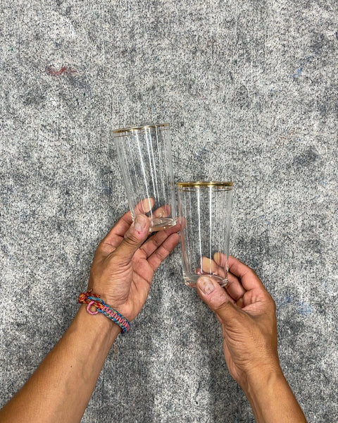 Two Gold Rimmed Drinking Glasses