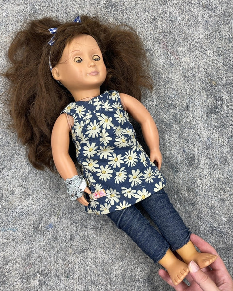 Blinking Doll with Daisy Dress and Jeans