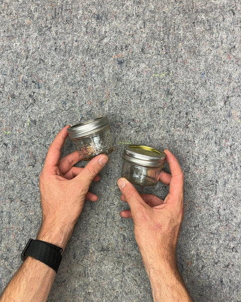 Two Small Glass Jars with Lids
