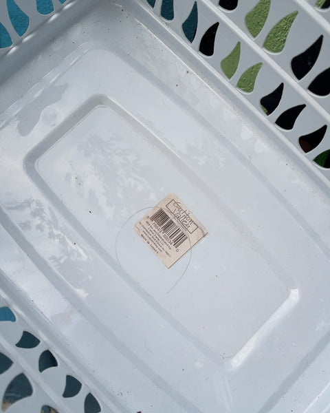 White Plastic Laundry Basket with Pink Handles