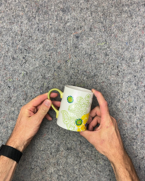 White Floral Pattern Mug with Green Handle
