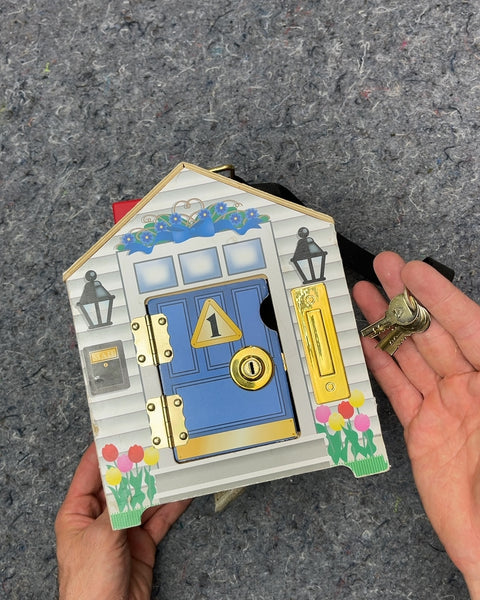 Melissa & Doug Latches Board Activity House
