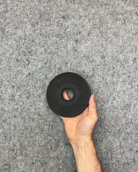 Black Round Cast Iron Trivet For A Teapot