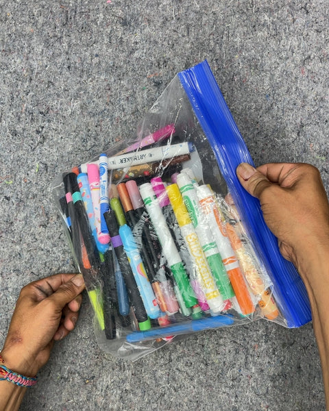 Assorted Markers and Crayons in Bag