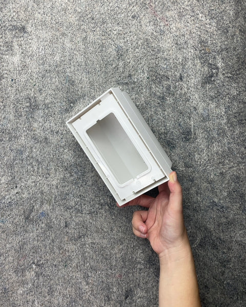 White Plastic Outlet Cord Cover