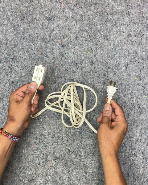 White Extension Cord with Three Outlets