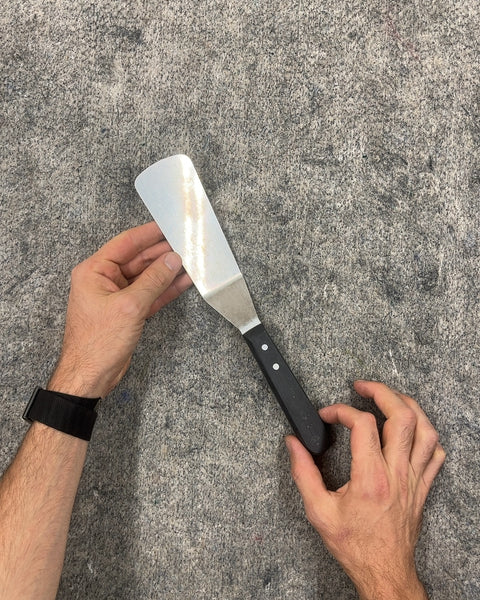 Metal Spatula with Black Handle
