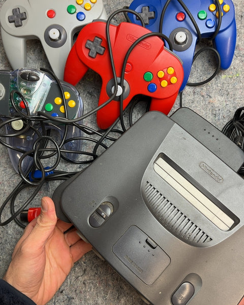 Nintendo 64 Console with 4 Controllers, Powers On Untested Otherwise