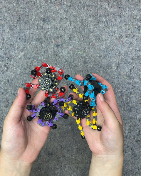 Four Colorful Tiny Mechanoid Looking Toys with Flexible Legs To Stand Up or Make Cool Shapes With