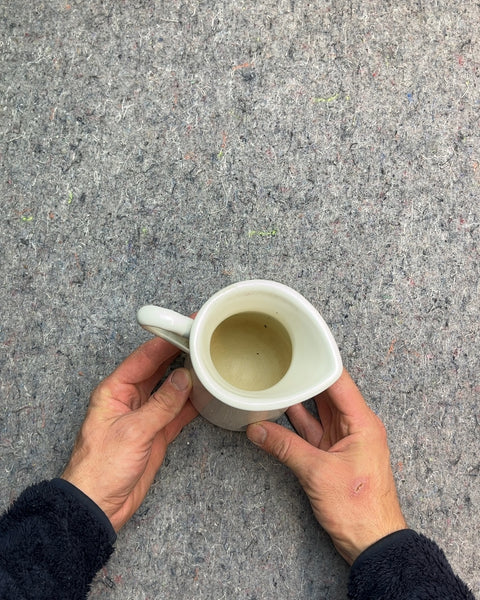 White Enamelware Pitcher