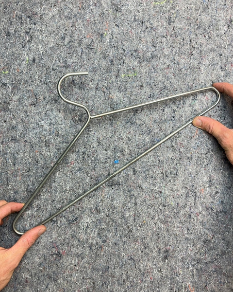 The Most Minimalist But Also Pretty Solid Metal Clothes Hanger
