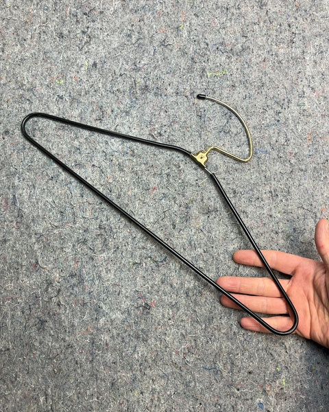 A Single Very Design Black Metal Skirt Hanger