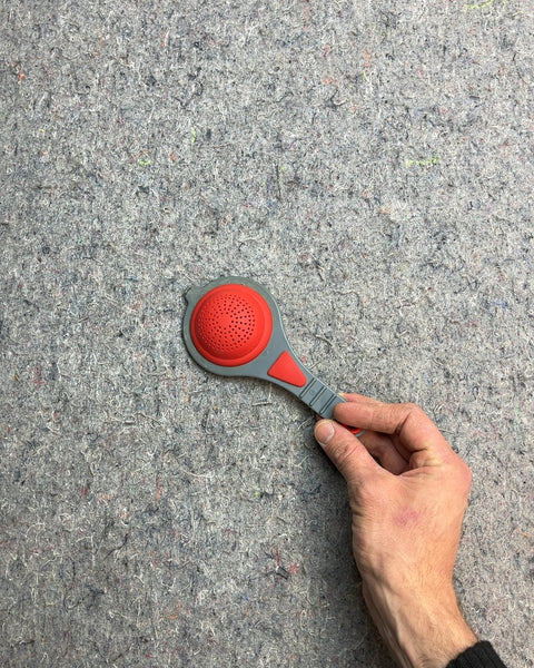 Red and Gray Strainer Spoon