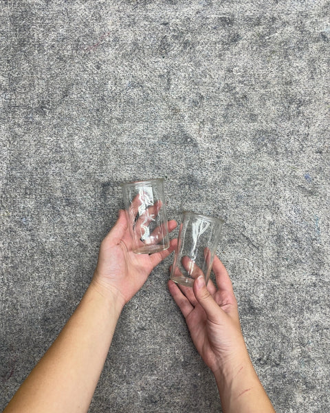 Two Tiny Glass Jars