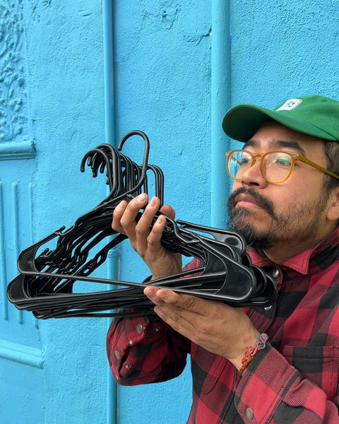 15 Or So Black Plastic Clothes Hangers