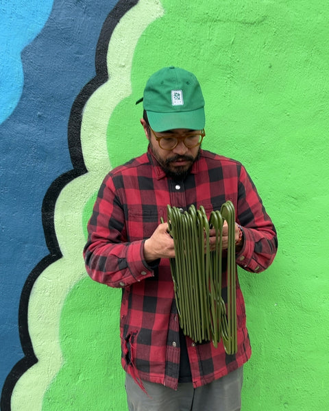 15 Or So Green Plastic Clothes Hangers