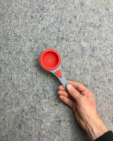 Red and Gray Strainer Spoon