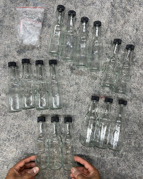 Clear Glass Hot Sauce Woozy Bottles with Black Caps, Set of 16