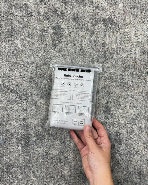 A Third Biodegradable Rain Poncho, One Size
