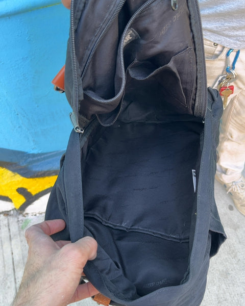 A Lil' Used Black Canvas Laptop Backpack