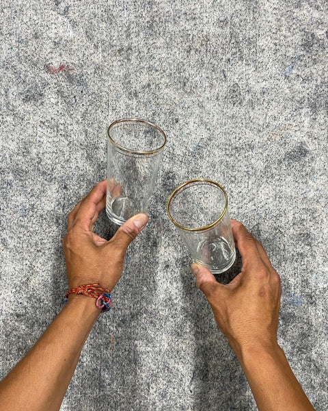 Two Gold Rimmed Drinking Glasses