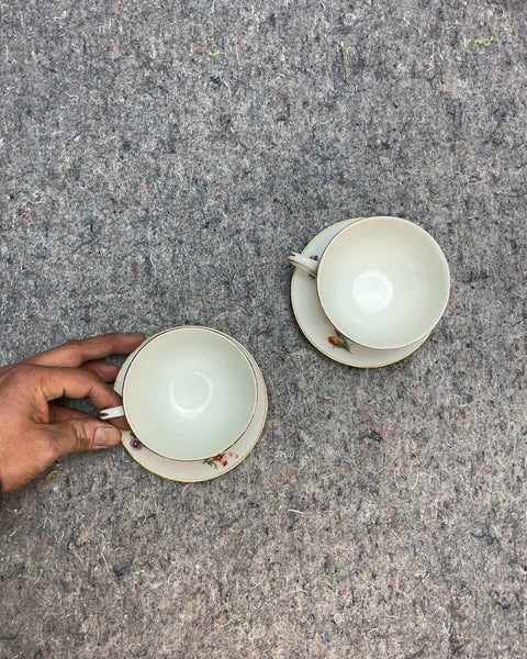 Two Floral Tea Cups and Saucers