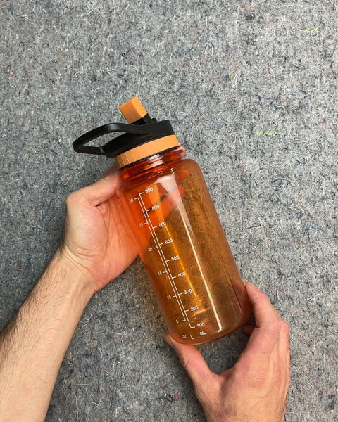 Orange Water Bottle That Can Help You Track Your Hydration Too